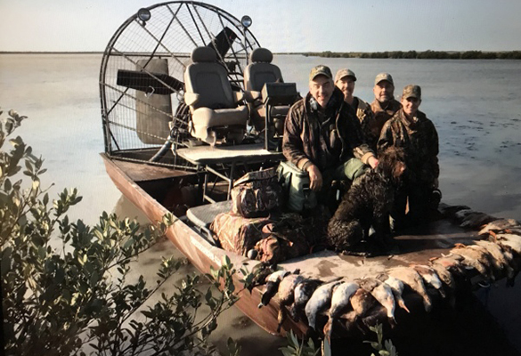 bird hunters on airboat